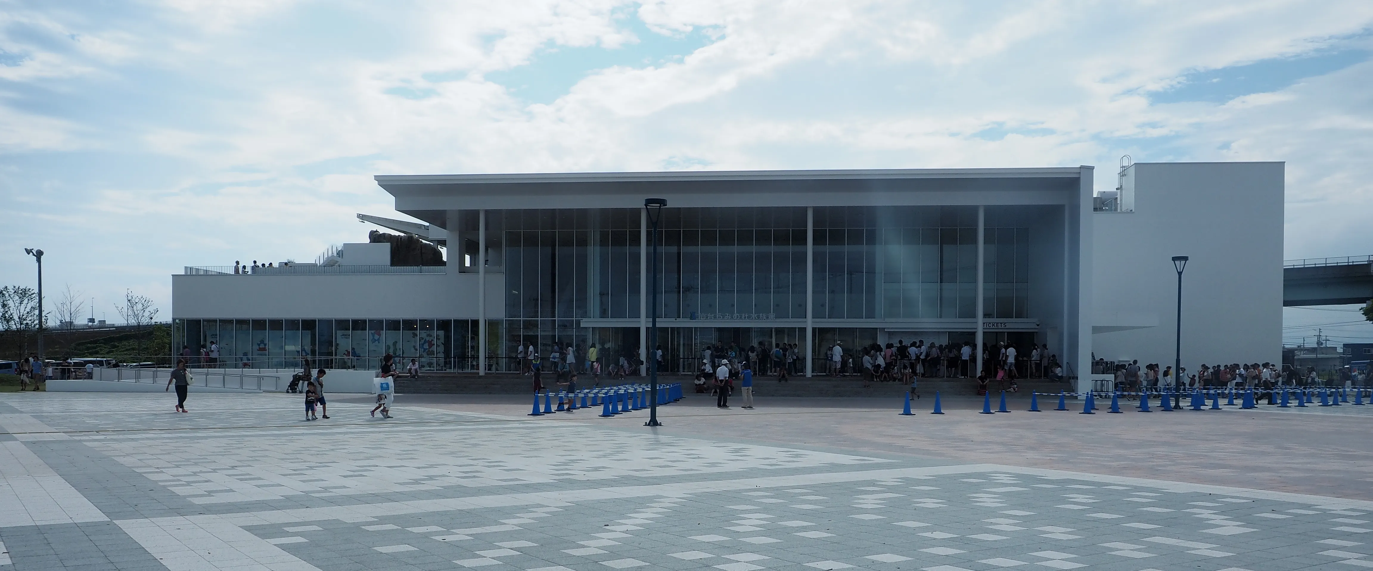 The exterior of Sendai Umino-Mori Aquarium in July 2015, not the 2026 Halloween displays or night event.